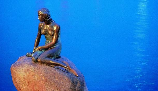 The Little Mermaid of Copenhagen celebrates its 100th birthday, in the middle of a gay pride